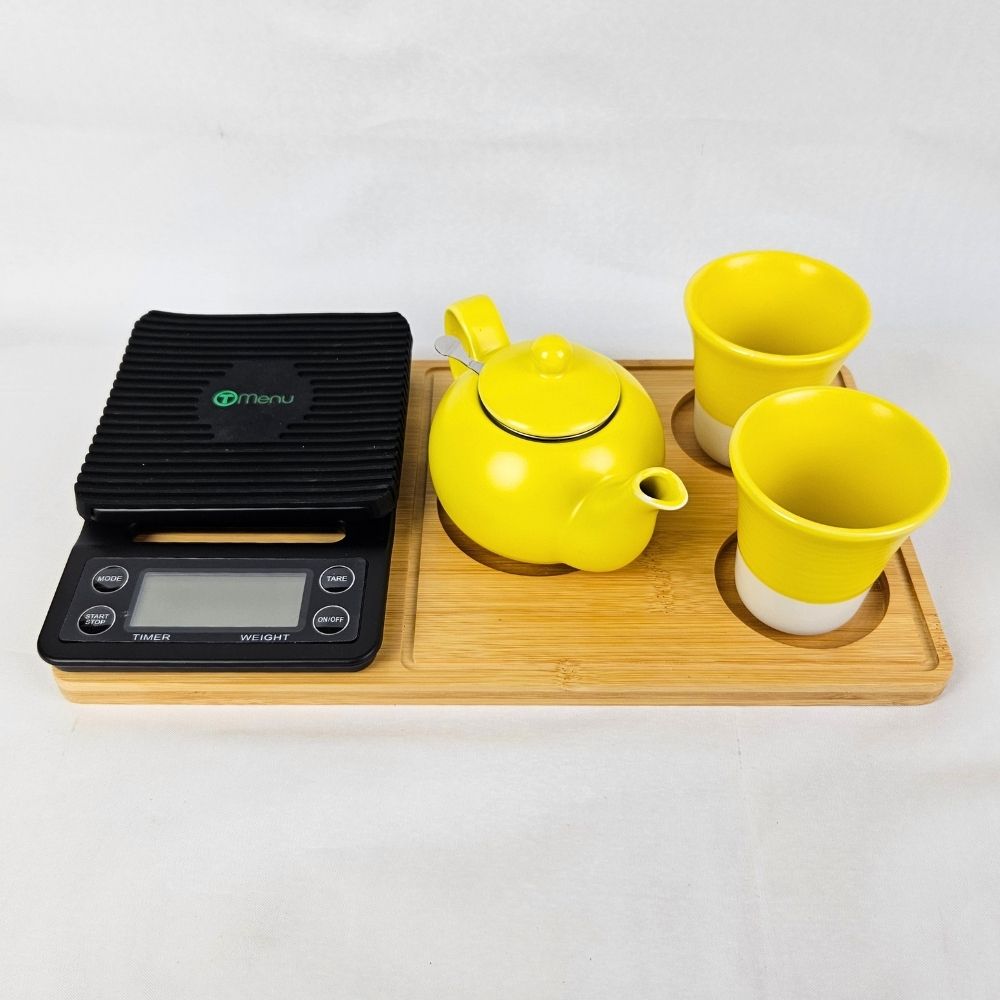 Yellow
Ceramic
Tea
Set,
Bamboo
Tray
and
Digital
Scales