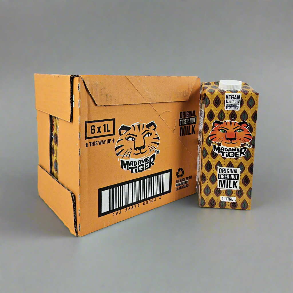 Cardboard box and a carton of Madam Tiger Original Tiger Nut Milk on a white background