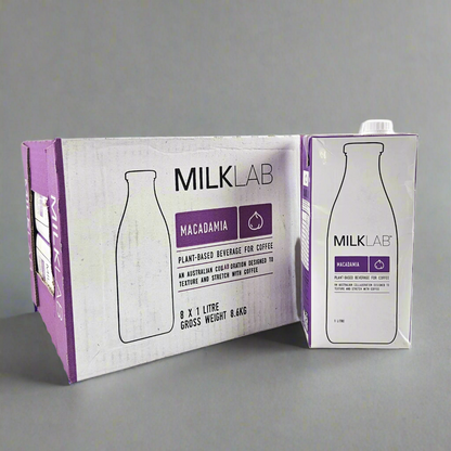 MilkLab macadamia plant-based beverage carton on a gray background